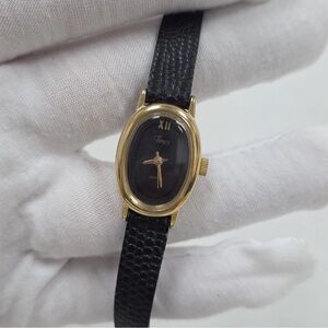 Vintage Timex Women's 80's Quartz Black Leather Straps Oval watch. New battery